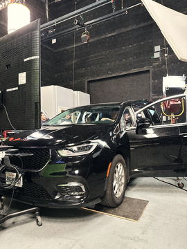 The picture car with its doors open under the stage lights